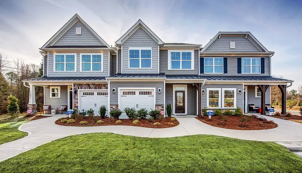 Front exterior of a home in the Attenborough Townhomes community, located in Piedmont, SC (Image 1).