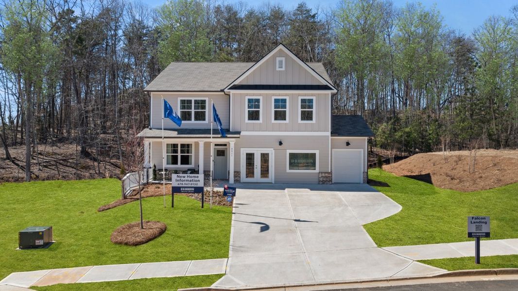 Front exterior of a home in the Falcon Landing community, located in Gainesville, GA (Image 1).