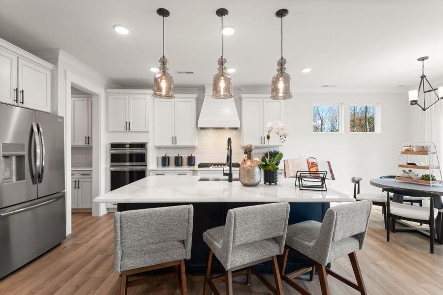 Furnished interior in a model home at Fiddler's Ridge in Advance (Image 9).