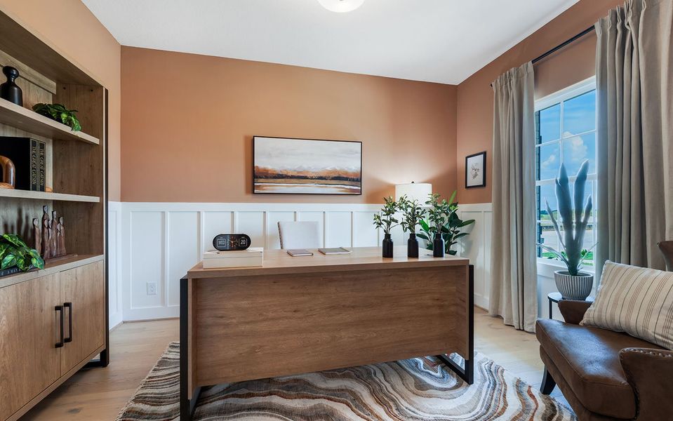 Furnished interior in a model home at Harvest Pointe in Needville (Image 3).