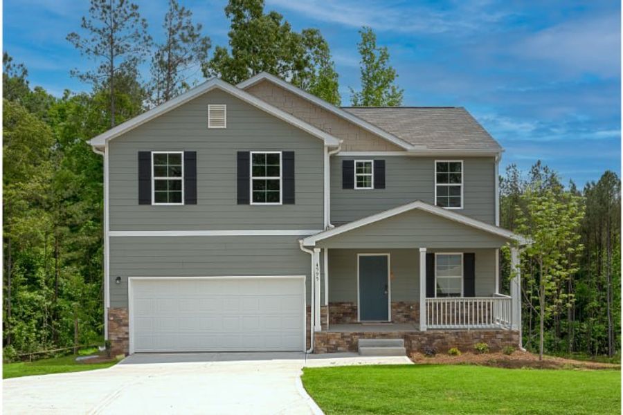 A house with a garage. A house with a garage.