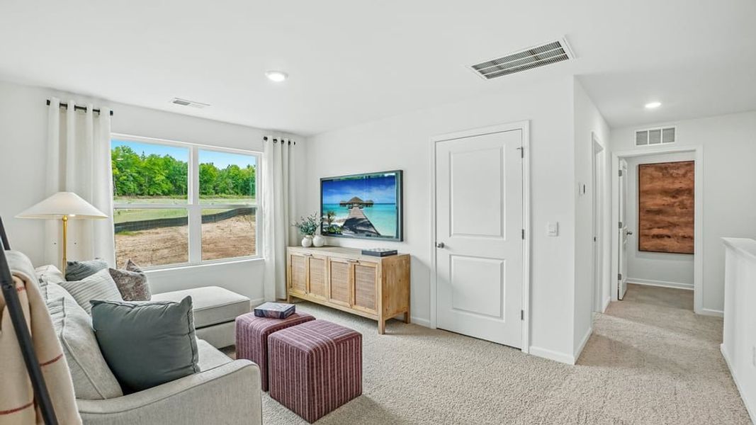 Furnished interior in a model home at Martin Farms in Aberdeen (Image 19).