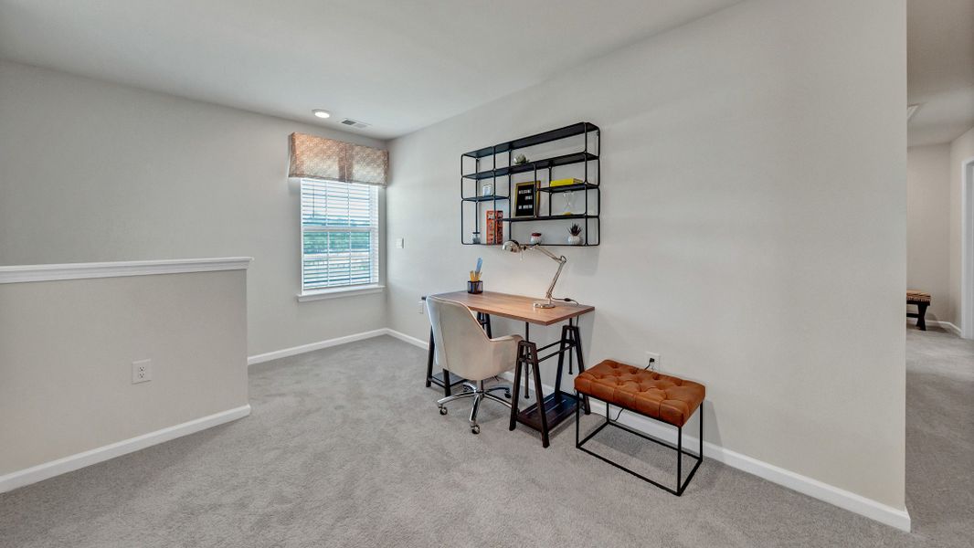 Furnished interior in a model home at South Haven in Camden (Image 26).