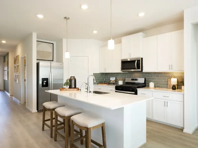 Furnished interior in a model home at Granger Pointe - Premier Series in Conroe (Image 6).