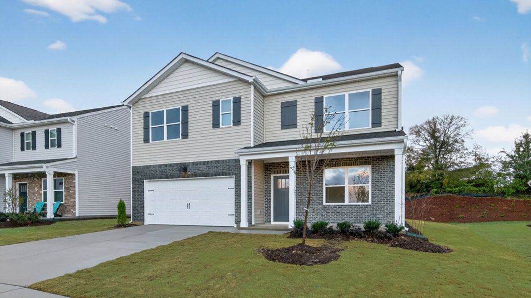 Front exterior of a home in the Honeycutt Oaks community, located in Angier, NC (Image 2).