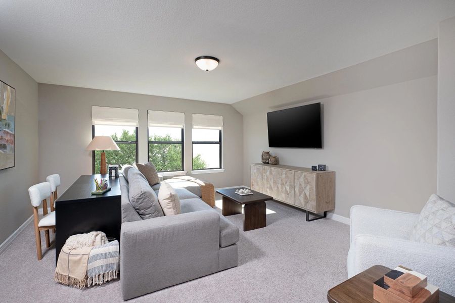 Furnished interior in a model home at Cedar Pointe in Crosby (Image 9).