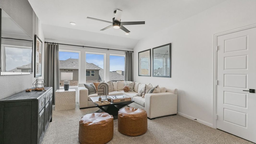 Elegant living room with expansive windows and plush seating in Beamer Villas. Elegant living room with expansive windows and plush seating in Beamer Villas.