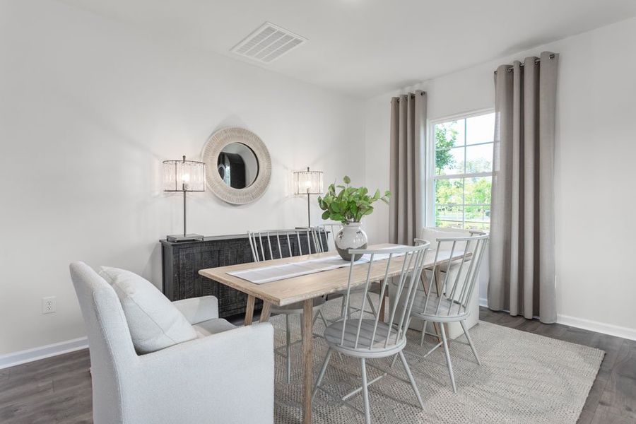 Furnished interior in a model home at Cedar Oaks in Greensboro (Image 4).