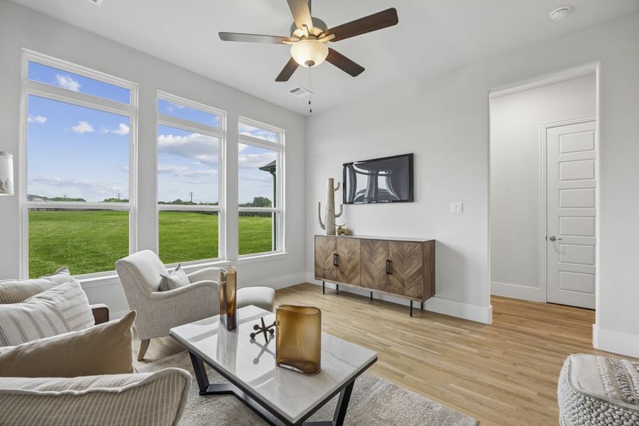 Furnished interior in a model home at Coppenger Place in Godley (Image 47).