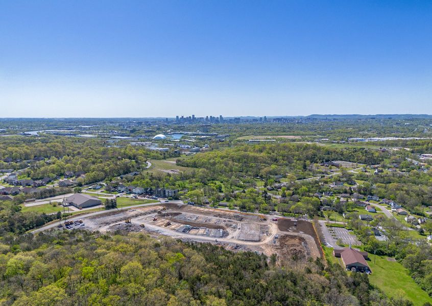 A landscape with trees and buildings.