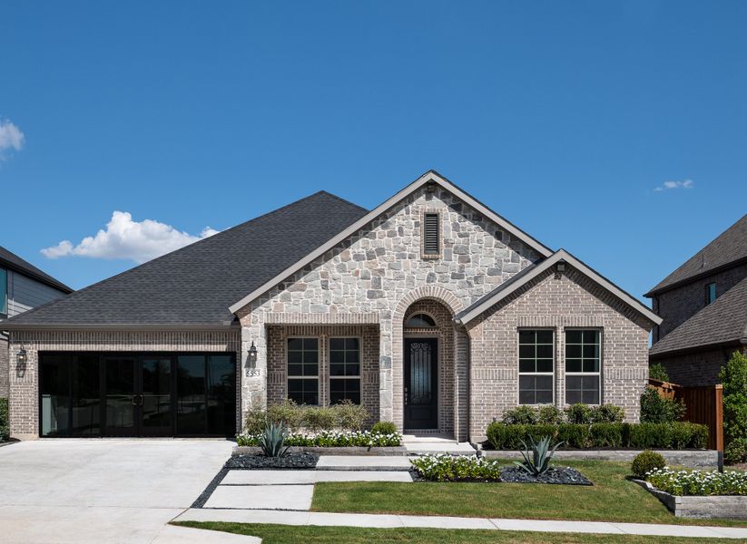 Front exterior of a home in the View at the Reserve 60s community, located in Mansfield, TX (Image 3).