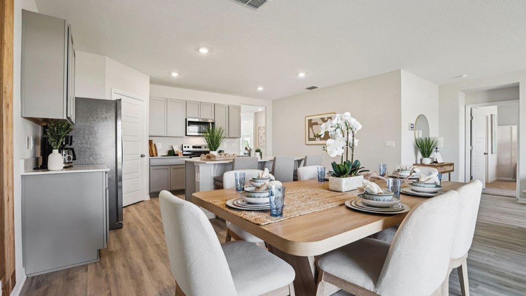 Furnished interior in a model home at Sun N Lake in Sebring (Image 9).