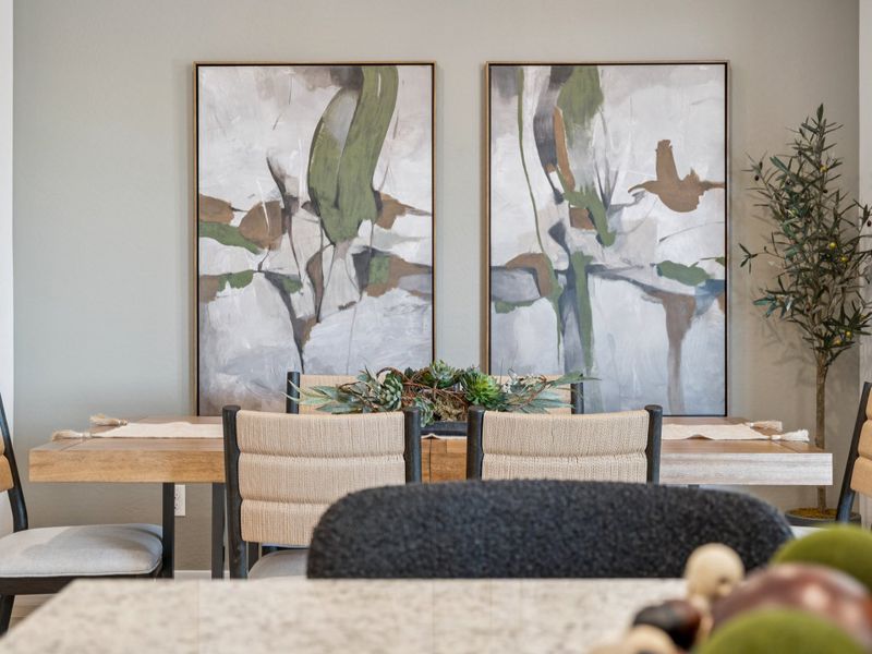 A room with chairs and tables.