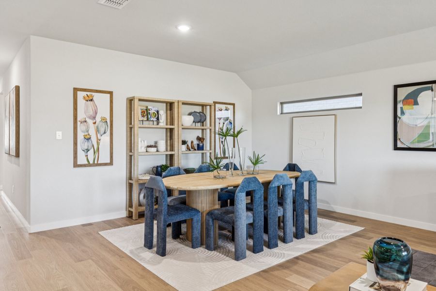 REPRESENTATIVE PHOTO – Dining Room in the Oscar model home in Aledo TX by Trophy Signature Homes