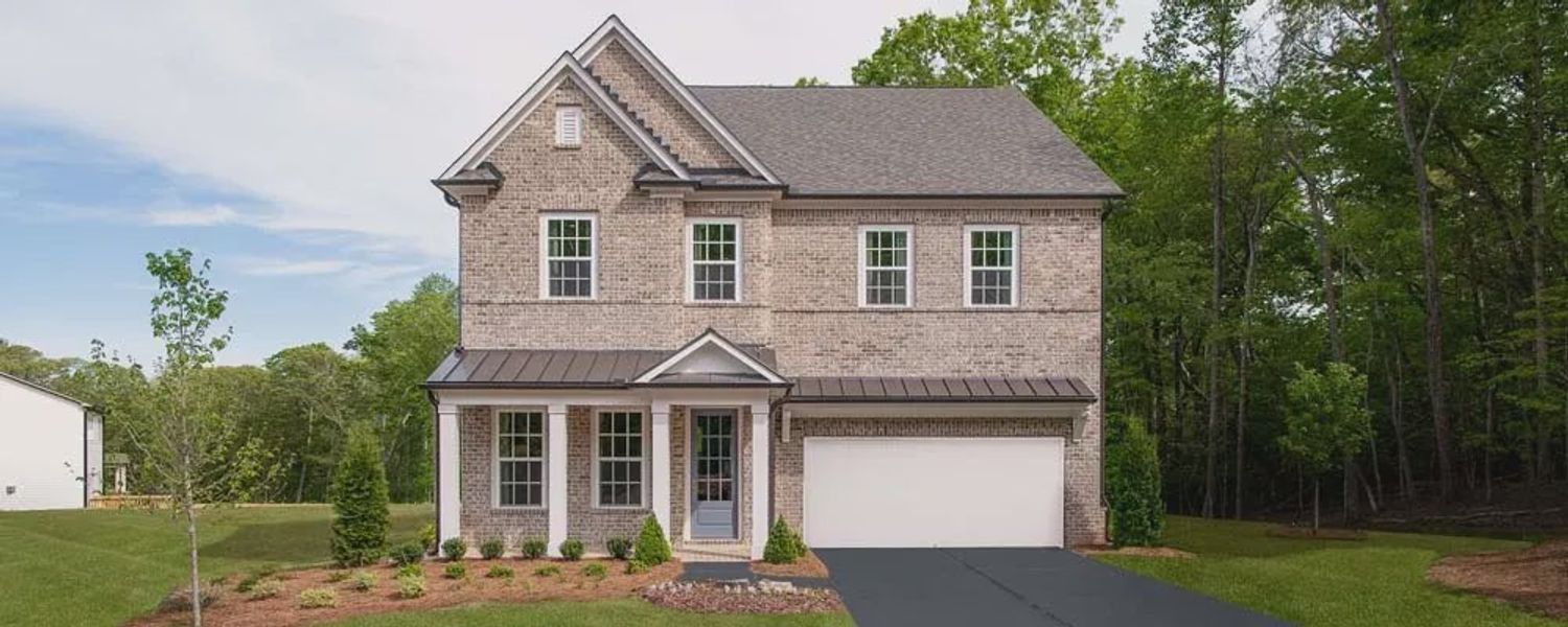 Front exterior of a home in the East Harbor II at Chestatee community, located in Dawsonville, GA (Image 4).