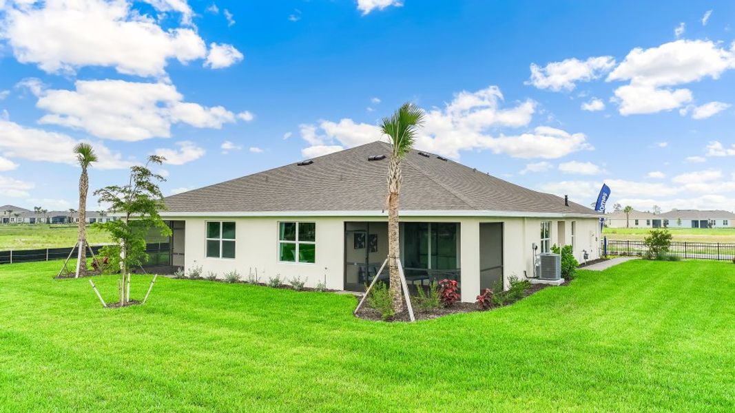 Front exterior of a home in the Palmetto Landing at Babcock Ranch community, located in Punta Gorda, FL (Image 9).