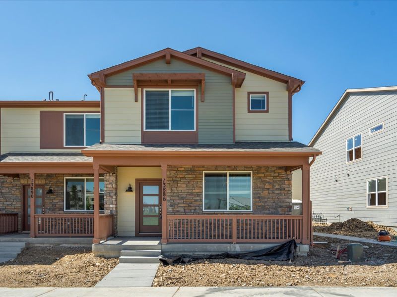 Exterior of the Woodland floorplan at a Meritage Homes community in Broomfield, CO.