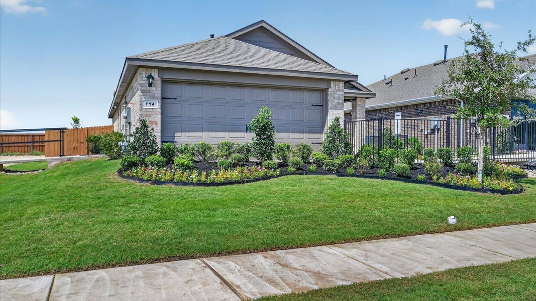 Front exterior of a home in the The Hills at Reunion community, located in Newark, TX (Image 13).