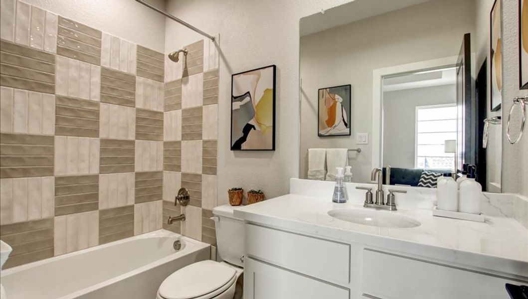 Furnished interior in a model home at Sunterra 40 in Katy (Image 40).