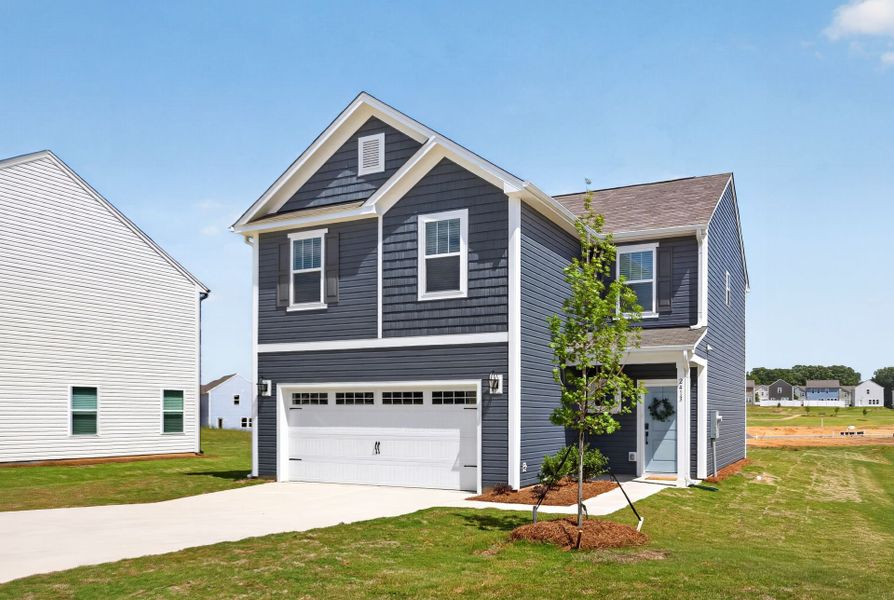 Front exterior of a home in the Oaks at St Martin community, located in Oakboro, NC (Image 2).