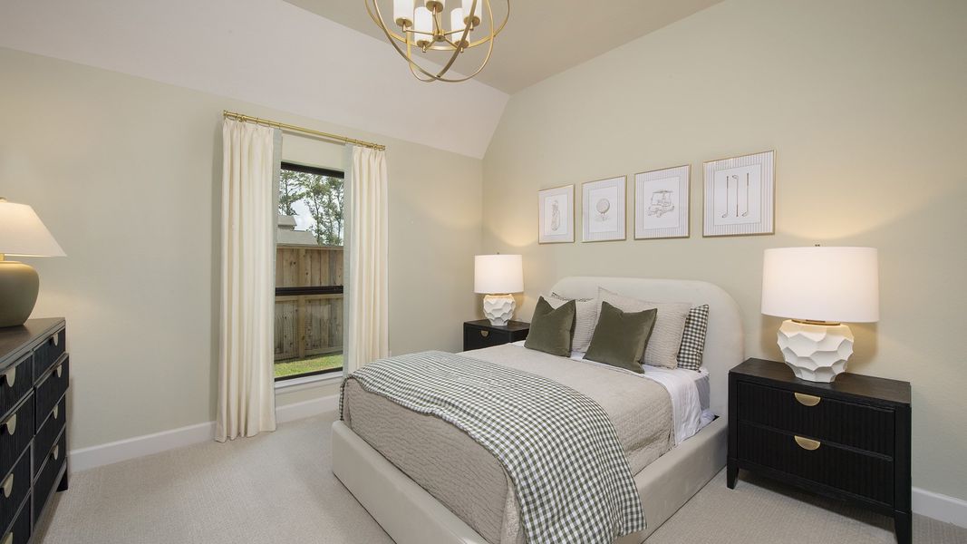 Furnished interior in a model home at The Highlands 65' in Porter (Image 20).