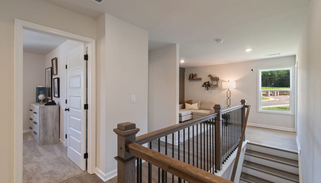 Furnished interior in a model home at Kentmere in Auburn (Image 41).