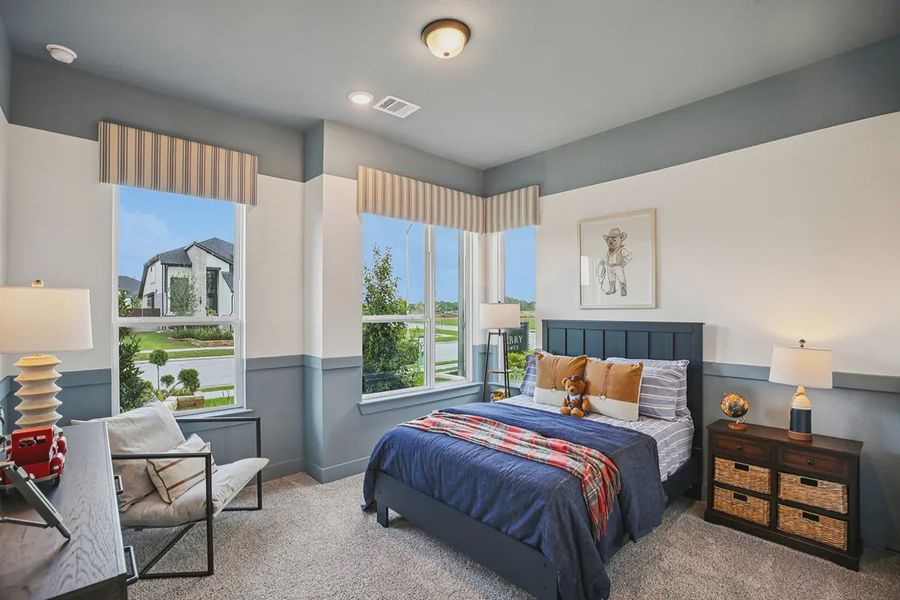 Furnished interior in a model home at Meridiana 50's in Manvel (Image 7).