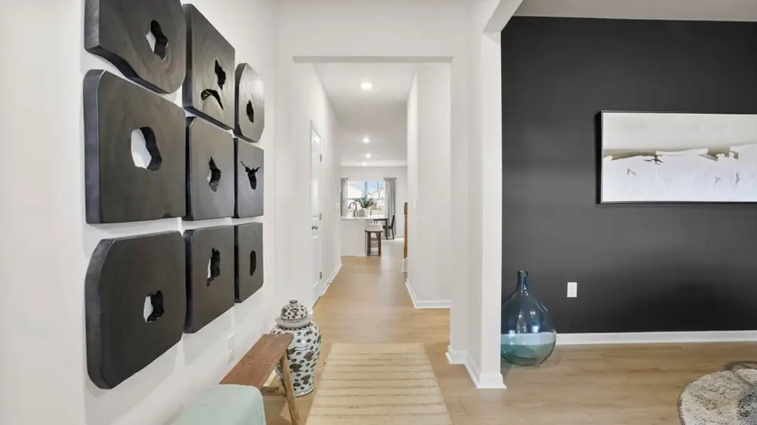 Furnished interior in a model home at Benjamin's Grove in Woodruff (Image 5).