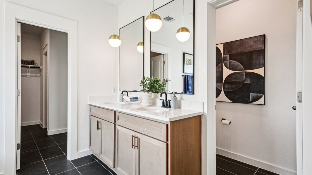 Double Vanity, Omegastone Countertops, Modern Light Fixtures, Private Water Closet