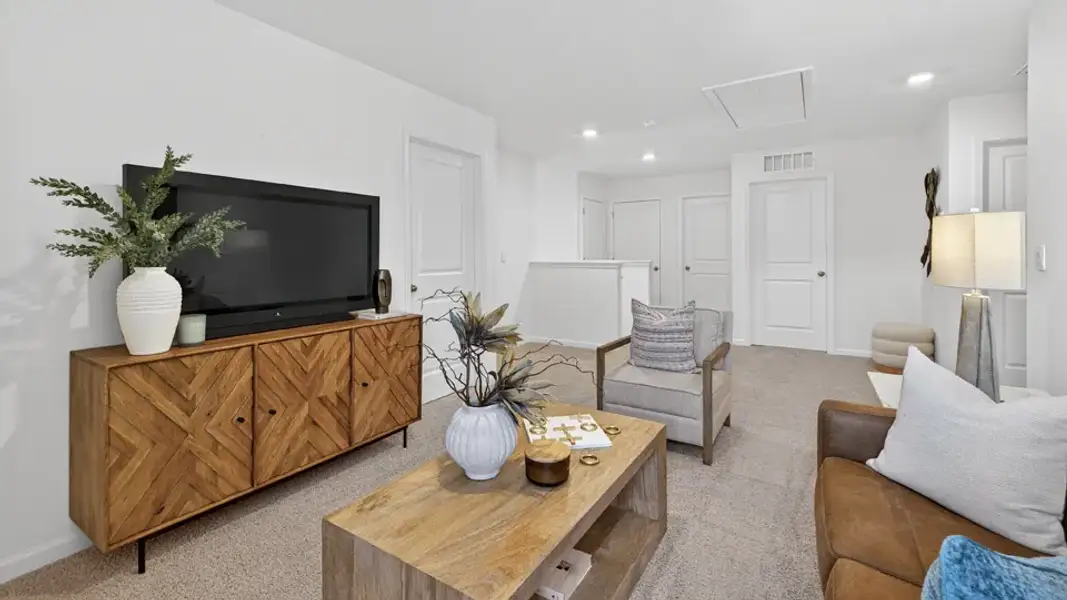 Furnished interior in a model home at Clifton Grove in Zebulon (Image 6).