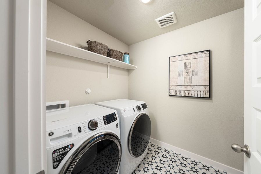 Furnished interior in a model home at Talley Fields in San Antonio (Image 38).