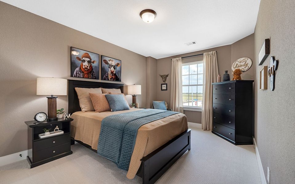 Furnished interior in a model home at Harvest Pointe in Needville (Image 25).