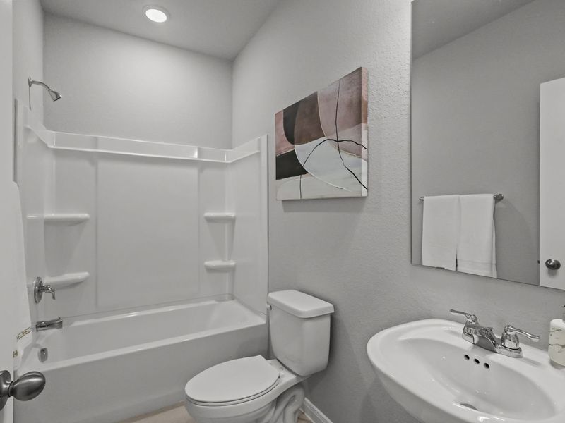 Furnished interior in a model home at Buffalo Way Villas in Houston (Image 17).