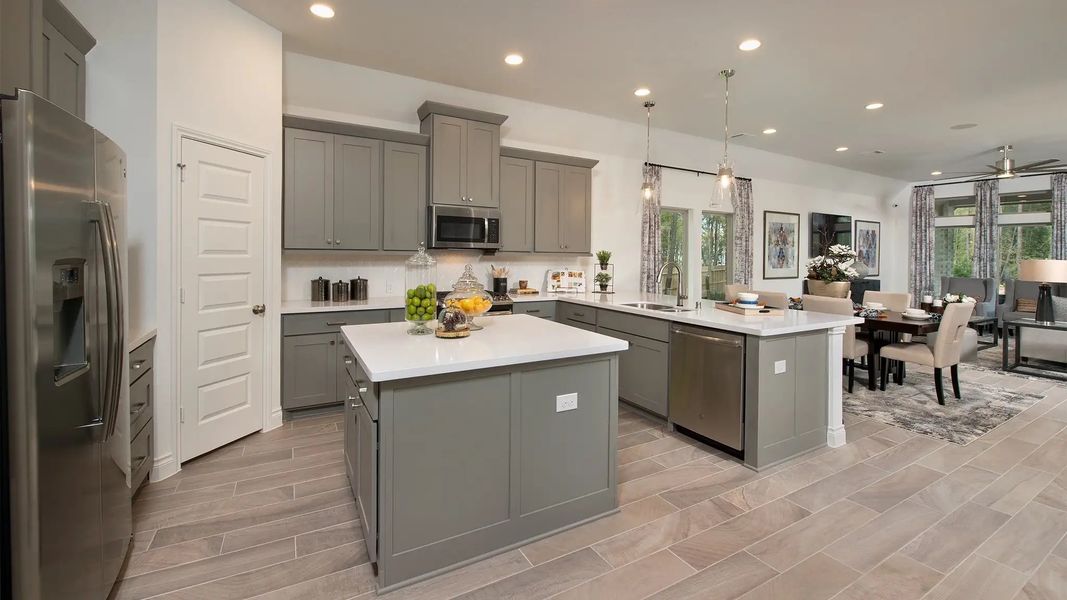 Furnished interior in a model home at Lakes Of Cane Island 45' in Katy (Image 26).