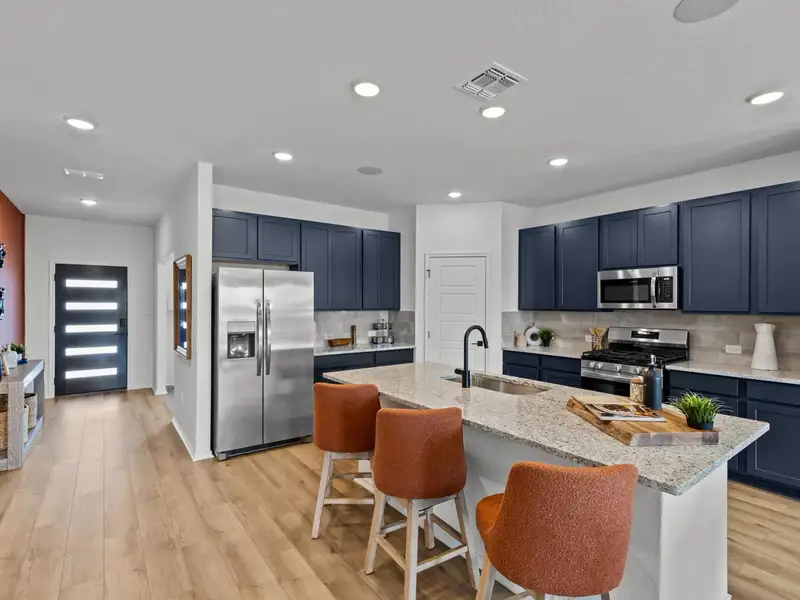 Furnished interior in a model home at Hickory Ridge in Elmendorf (Image 3).