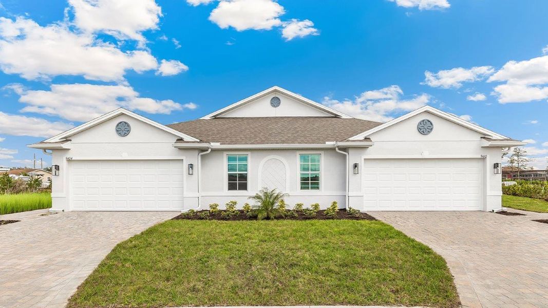Front exterior of a home in the Sea Cove community, located in Punta Gorda, FL (Image 2).