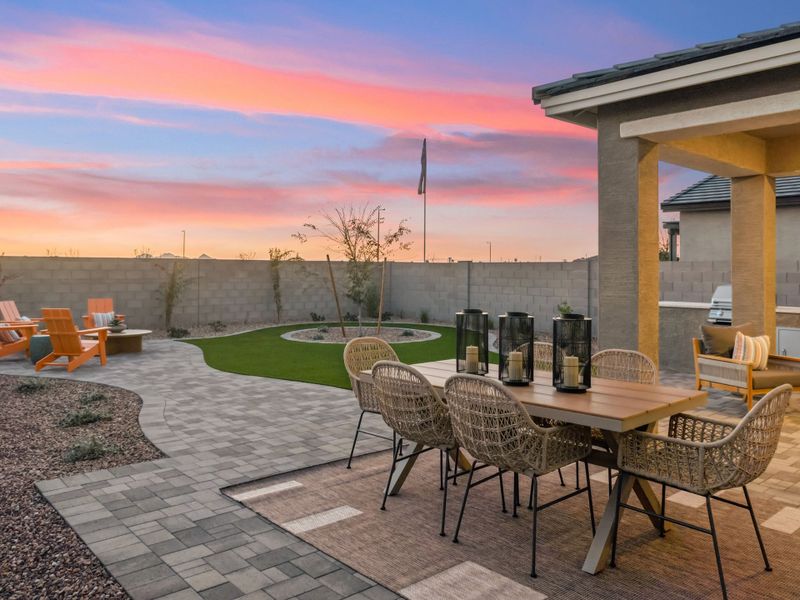 A patio with a table and chairs. A patio with a table and chairs.