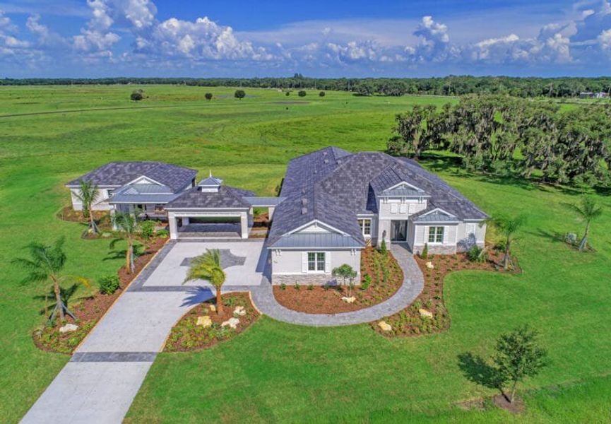 Front exterior of a home in the Hampton Lakes community, located in Sarasota, FL (Image 37). Front exterior of a home in the Hampton Lakes community, located in Sarasota, FL (Image 37).
