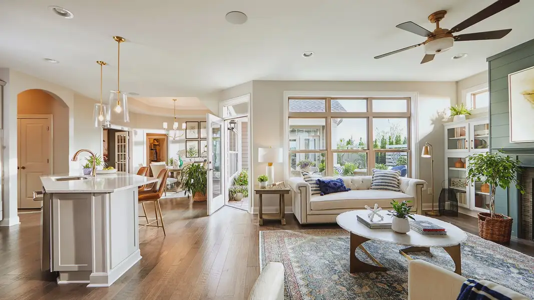 Furnished interior in a model home at The Courtyards at Bailey Farms in Dacula (Image 9).