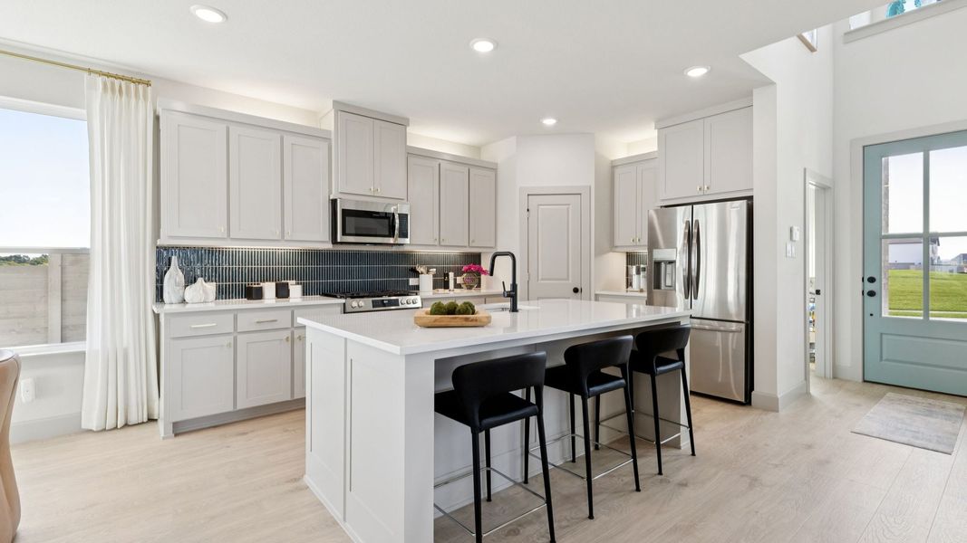 Furnished interior in a model home at Painted Tree - Woodland North in McKinney (Image 11).