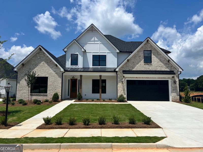 Front exterior of a home in the Mill Farms community, located in Peachtree City, GA (Image 4).
