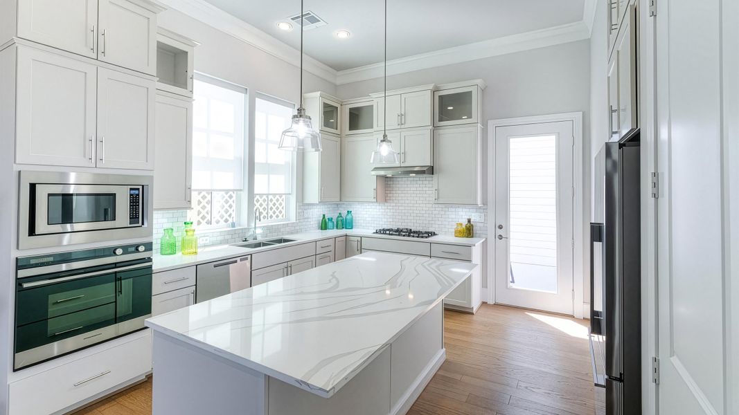 Furnished interior in a model home at Chatterton Oaks in Houston (Image 5).