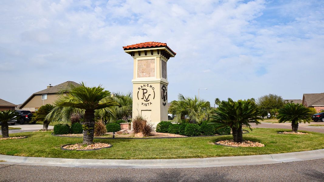 Entrance to the Rancho Vista community in Corpus Christi, TX, featuring signage and landscaping (Image 1).