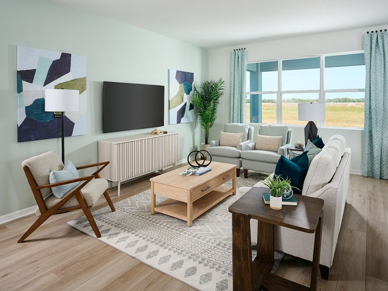 Furnished interior in a model home at Coasterra - Reserve Series in Palmetto (Image 5).