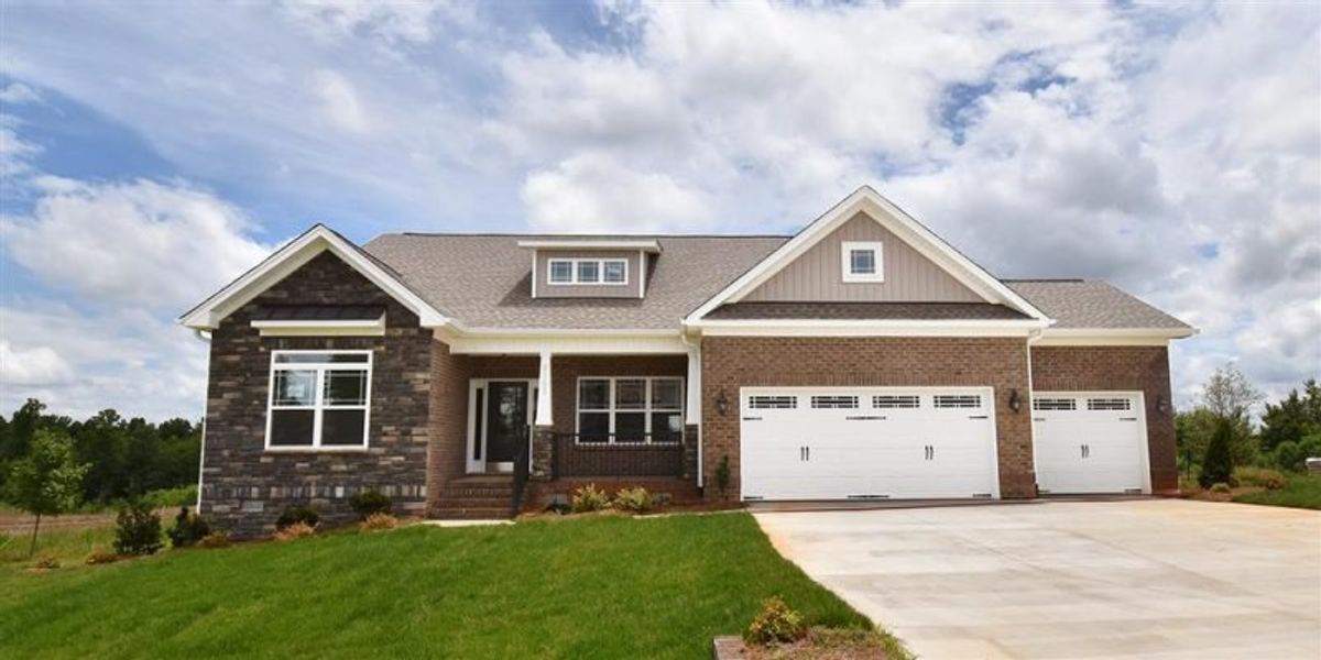 Front exterior of a home in the Northwest Meadows community, located in Stokesdale, NC (Image 17). Front exterior of a home in the Northwest Meadows community, located in Stokesdale, NC (Image 17).
