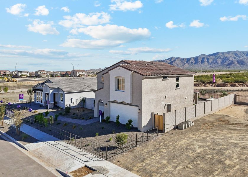 A building with a fence around it. A building with a fence around it.