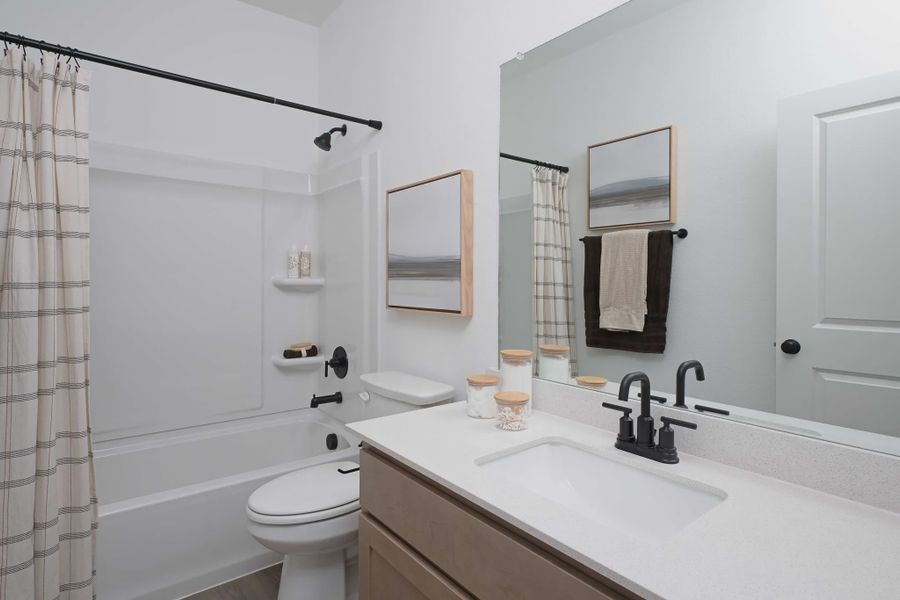 Furnished interior in a model home at Creekview Fossil Ridge in Pilot Point (Image 17). Furnished interior in a model home at Creekview Fossil Ridge in Pilot Point (Image 17).