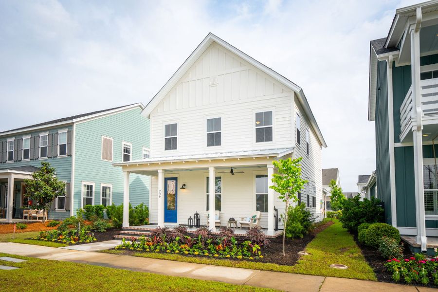 Front exterior of a home in the The Piedmont Collection at Midtown Nexton community, located in Summerville, SC (Image 1). Front exterior of a home in the The Piedmont Collection at Midtown Nexton community, located in Summerville, SC (Image 1).