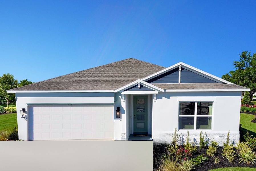 Front exterior of a home in the Villa Pass community, located in Groveland, FL (Image 2).