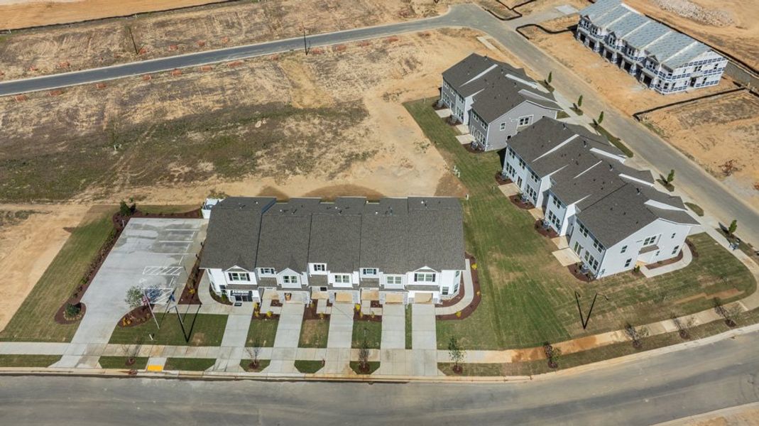 Aerial view of the Chapel Townes community in Raleigh, NC, showing layout and nearby surroundings (Image 12). Aerial view of the Chapel Townes community in Raleigh, NC, showing layout and nearby surroundings (Image 12).